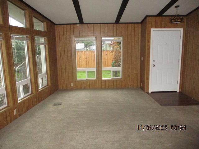 Front door/entry & half of front room.
