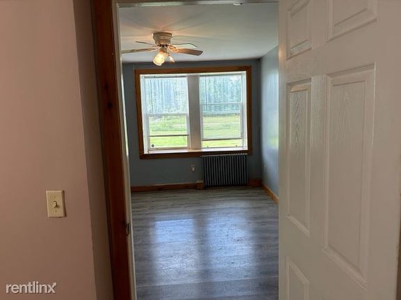 Living room windows from smaller bedroom
