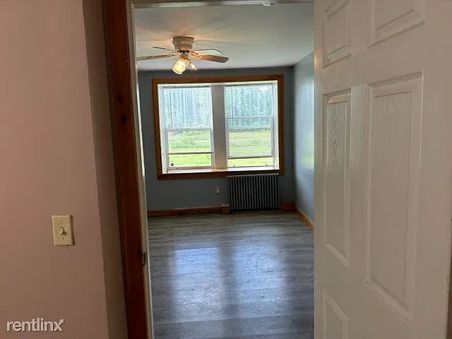 Living room windows from smaller bedroom