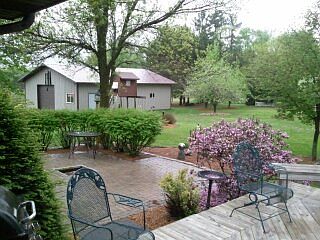 BRICK PATIO AND WOOD DECK