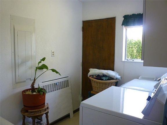 The laundry room area-there is a 3/4 bath just off this room with a semi-circular shower-very unique