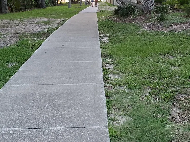 Paved path to benches for sunset watching