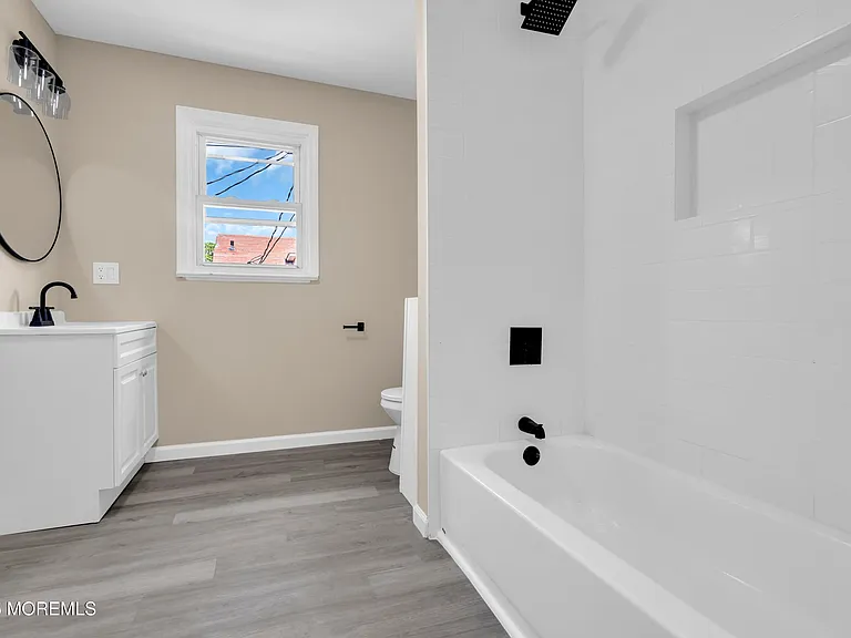 Brand-new full bathroom with vanity and tub/shower