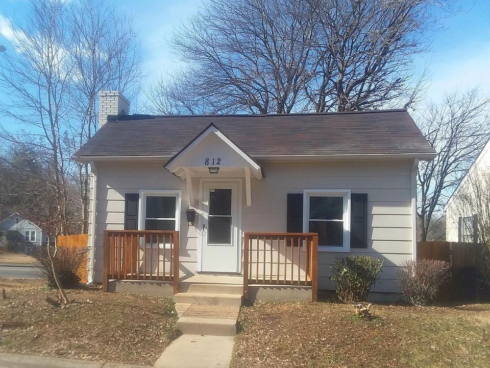 Welcome home! Fresh paint, new shutters, and stained porch railings. Landscaping was recently trimmed back and will provide a multitude of greenery in the spring.