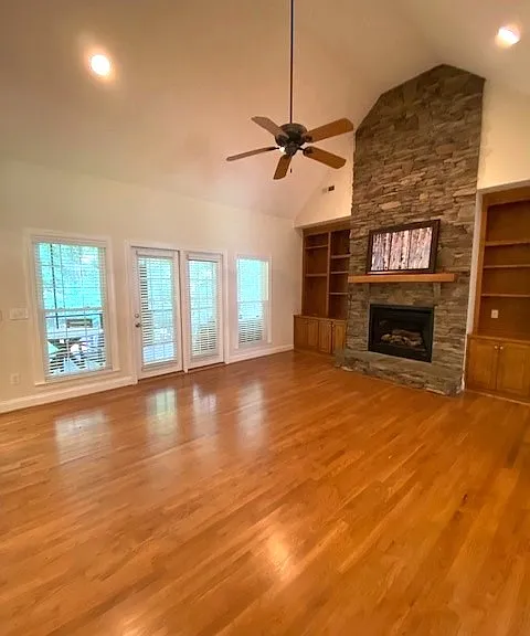 Living Room as it leads to the screened in back deck