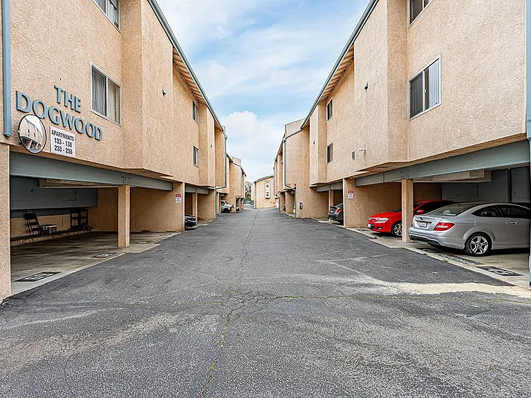 Gateed and assigned tuck-under parking spots at Olive View Gardens.