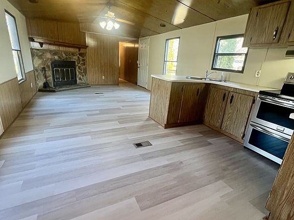 Newly renovated, open kitchen, dining, and living room.