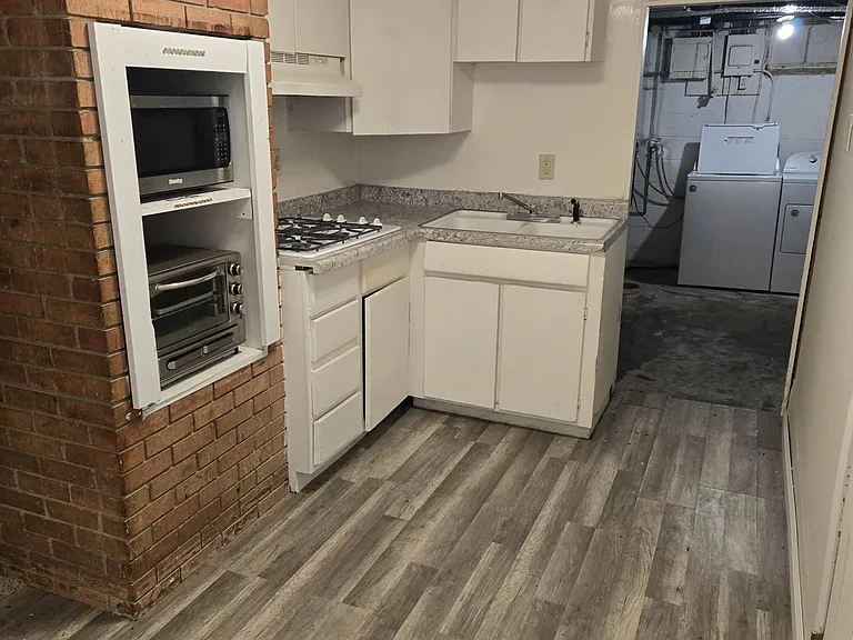 Non traditional kitchen, includes microwave, toaster oven, and stove top (NO STOVE)