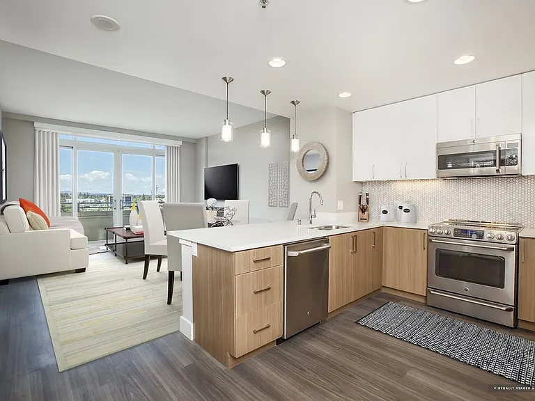 Signature Collection Kitchen Living and Dining Area with Hard Surface Vinyl Plank Flooring