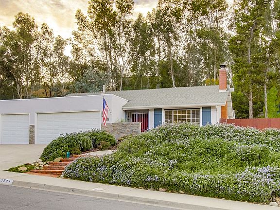 3 car garage & RV parking!