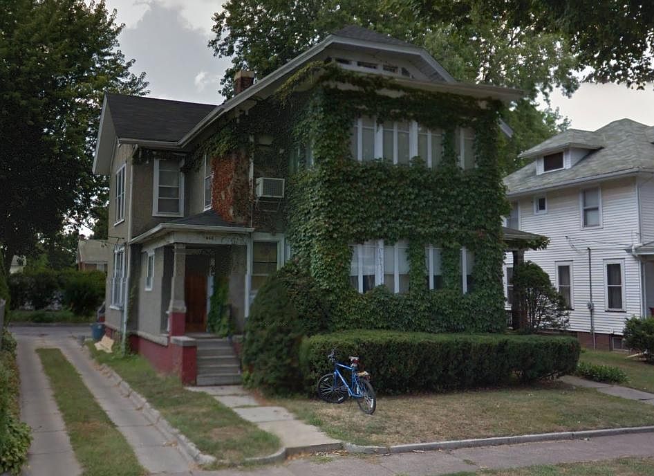 Google Streets img, 2012 Grey stucco. Crawling ivy has been