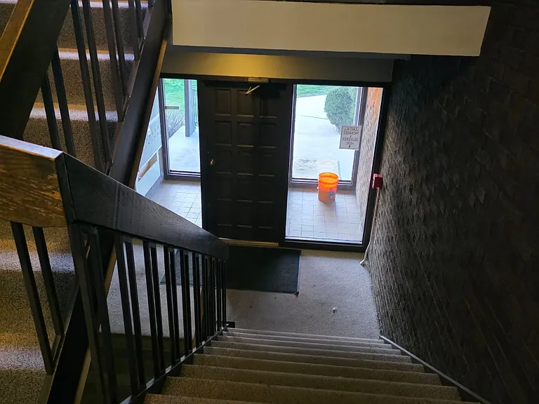 Staircase and entrance to the living room from the poolside too.