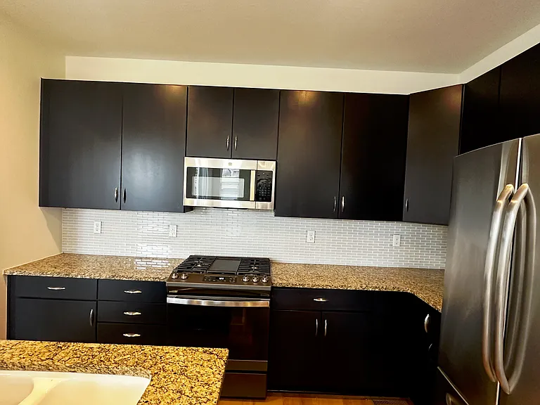 Updated kitchen cabinets and appliances
