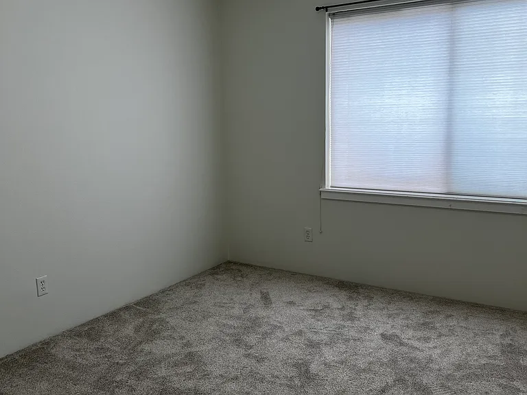 Guest or kids bedroom #1 with new paint, carpet and ductless heat and AC
