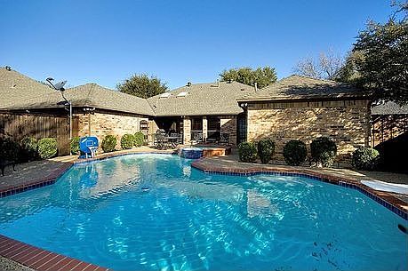 Enjoy your oasis backyard with diving pool & spa.