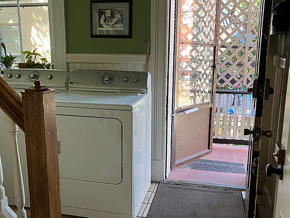 Private entrance door through the small backyard porch