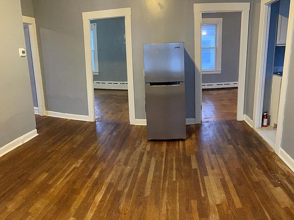 Dining room showing both bedrooms, entry to kitchen & living room