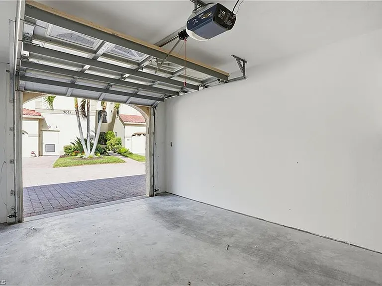 7048 Pelican Bay Blvd #C-302 — Photo 33