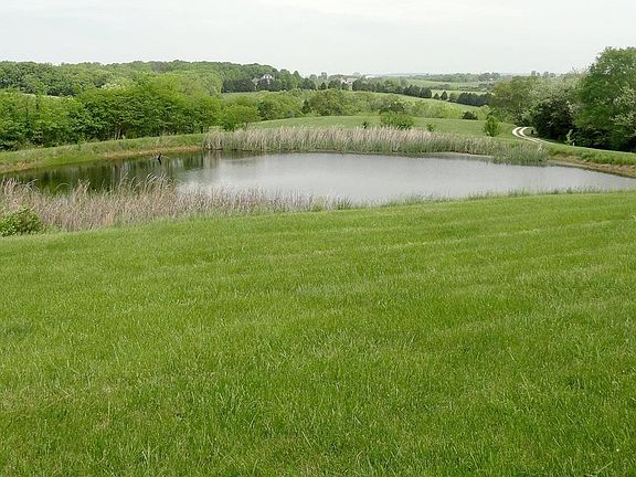 One half acre pond with a fabulous view overlooking the countryside.