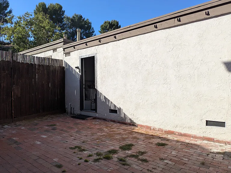 Private Patio - Door to Garage