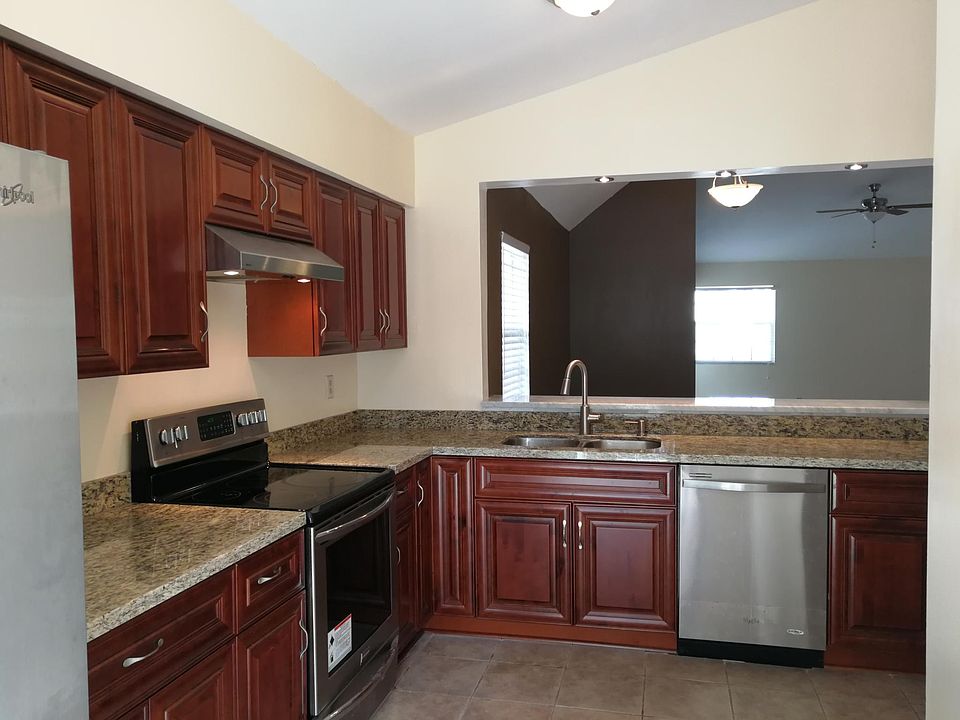 Kitchen (brand-new counter tops & cabinets)