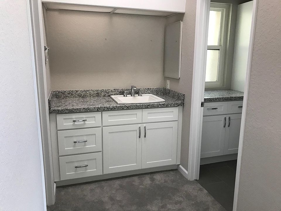 Full bathroom remodel with granite countertops. Everything is new.
