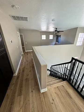 hallway to bedrooms #2 & #3 and loft