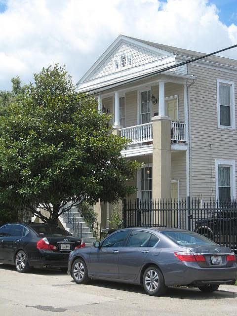 Front exterior- apartment is upper right