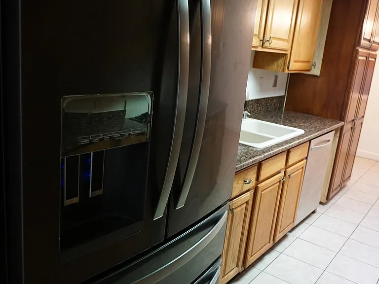Kitchen with large high end fridge