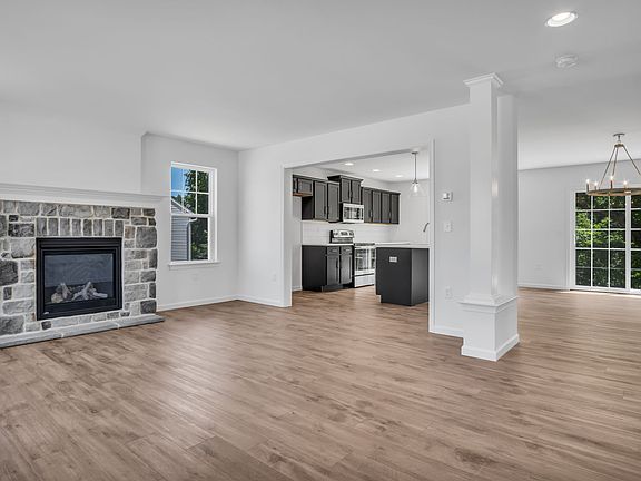 Living room with fireplace of the Charlotte Model from Garman Builders