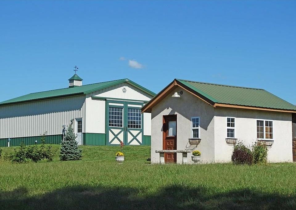 Cabin and metal barn