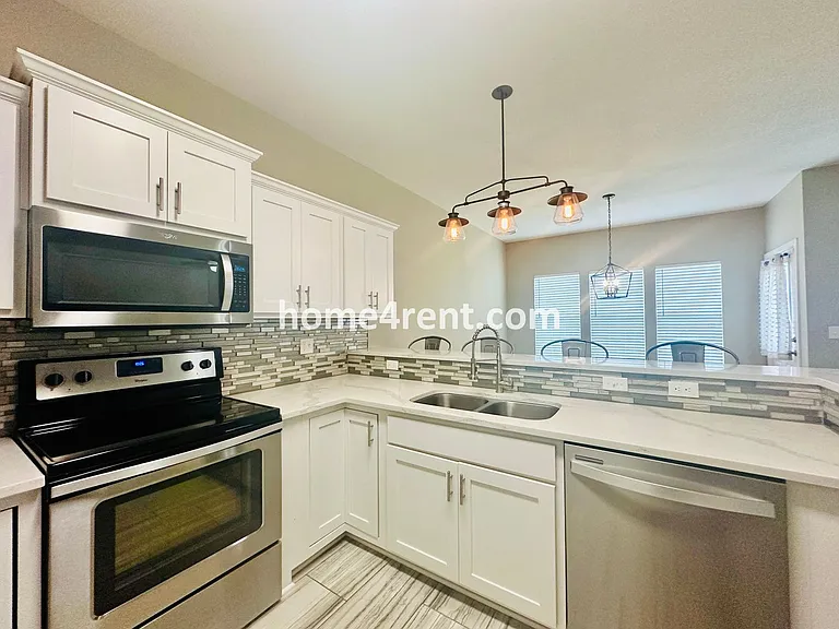 12701 E 47th Terrace Ct S — Photo 12