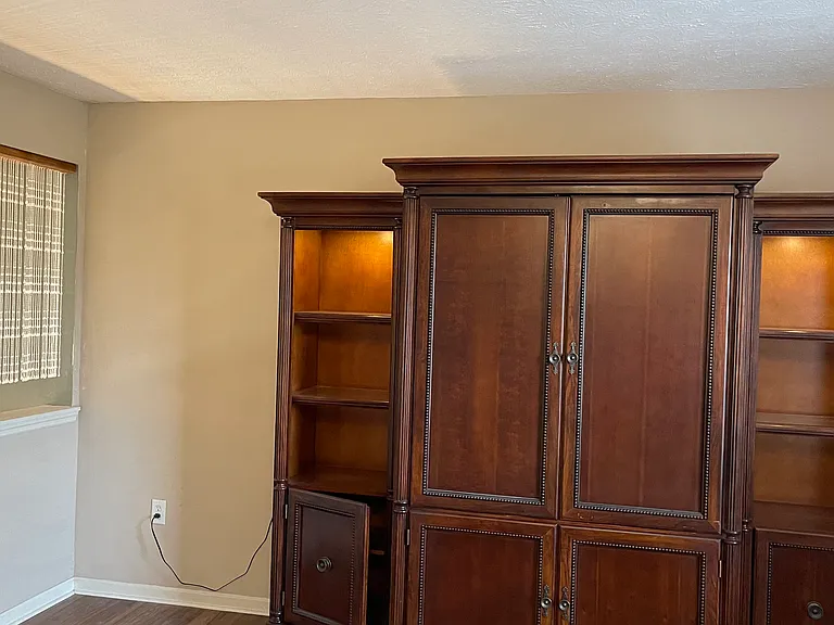 loft bedroom with armoire wardrobe
