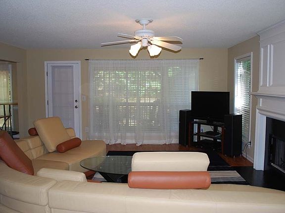 Stylish Family Room with Built in Fireplace!