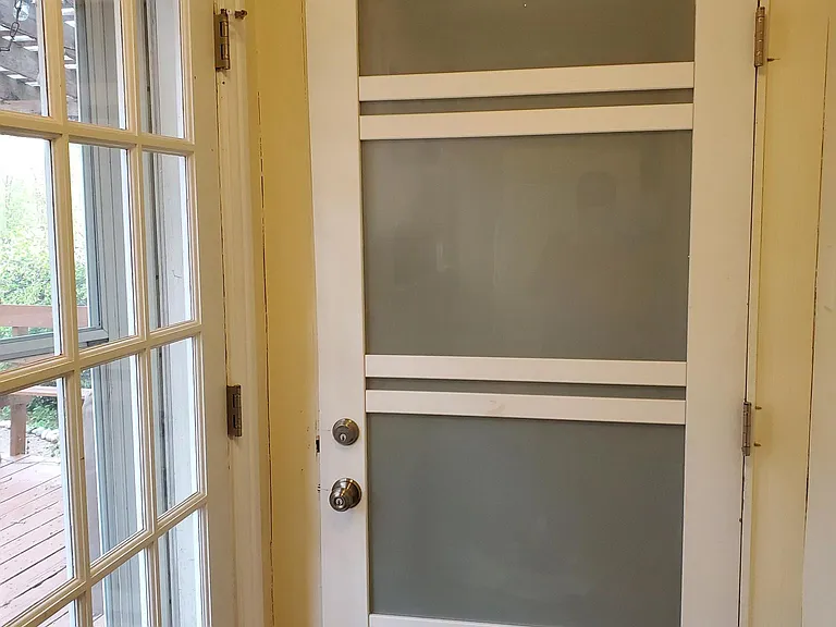 Separate entrance to basement unit off rear of home.