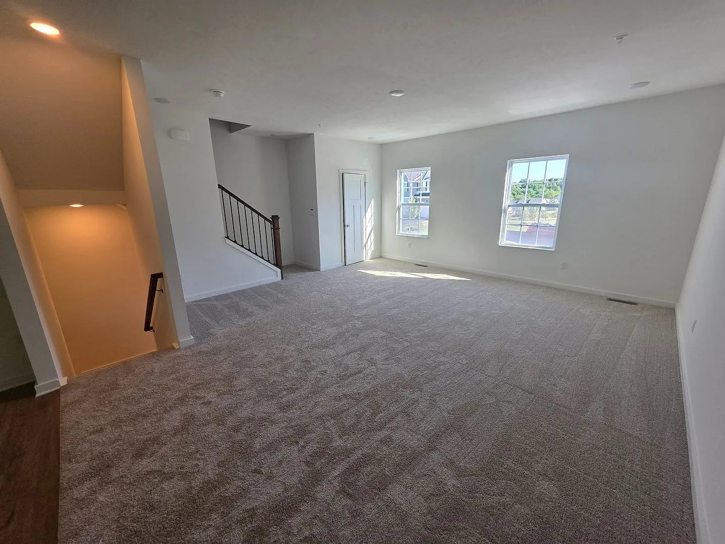 Brand-new townhome with modern finishes, flexible living space, and low-maintenance living. — Photo 4