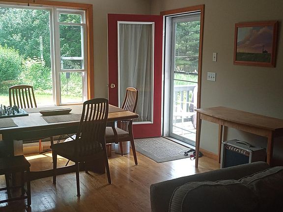 Dining / Lvrm. Picture window, backyd , kitchen to right.