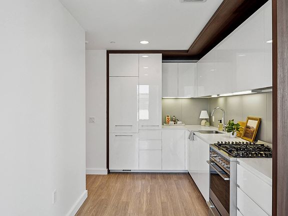 Italian Cabinetry and Quartz Slab Countertops