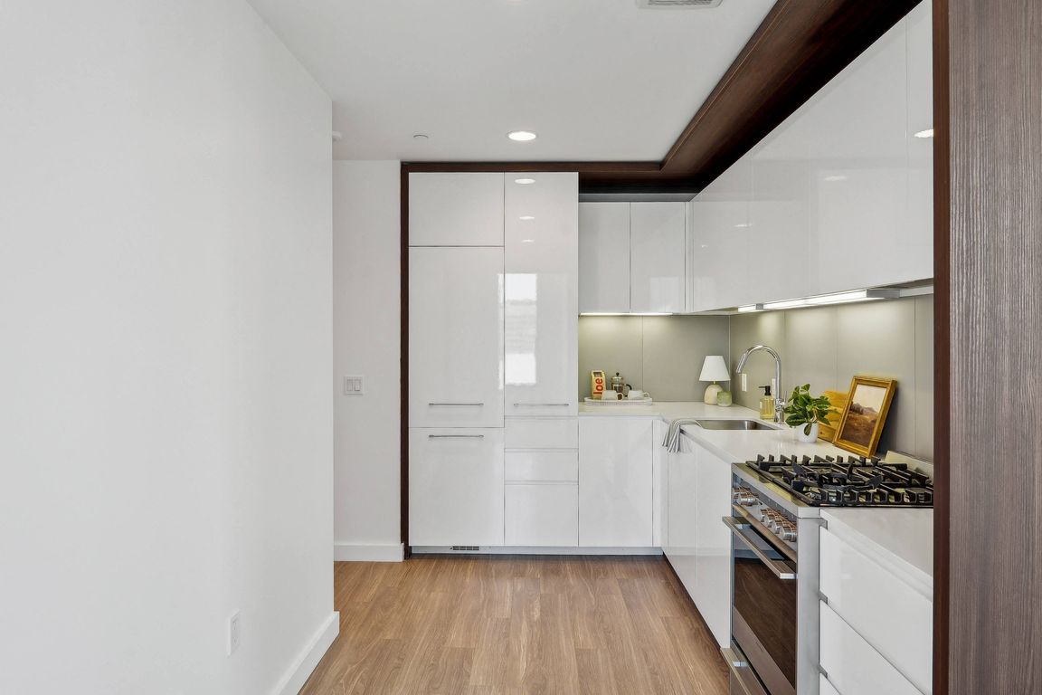 Italian Cabinetry and Quartz Slab Countertops