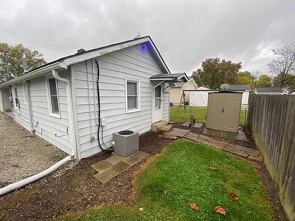 Exterior - Backdoor & Backyard (Small Storage Shed)