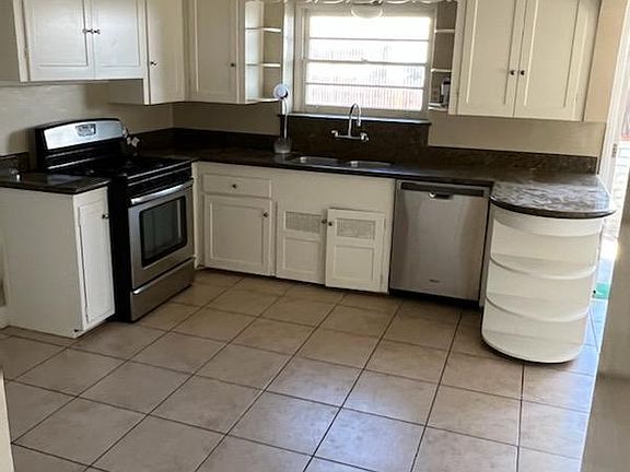 kitchen with large pantry and connecting breakfast nook