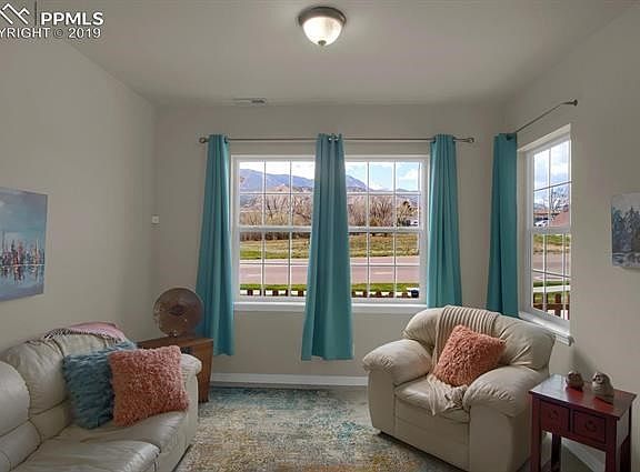 Lots of natural light with a great view of the mountains and Pikes Peak.