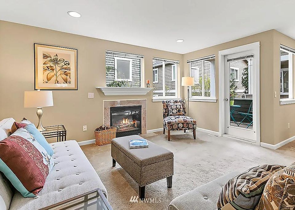 Deck off the living area with fireplace