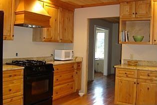 Omega Cabinets & Granite Countertops