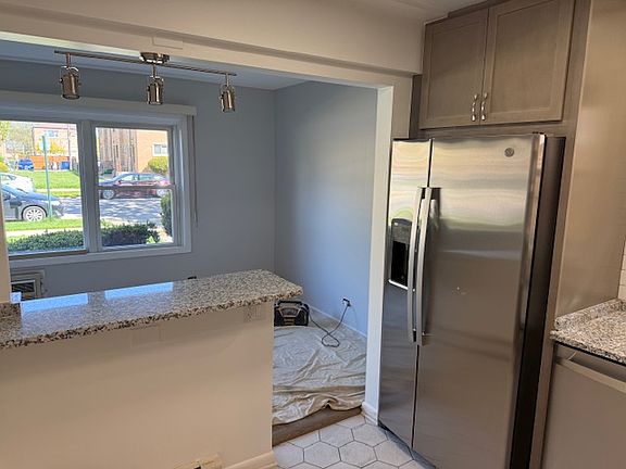 5th image of 4707 Washington St APT 102