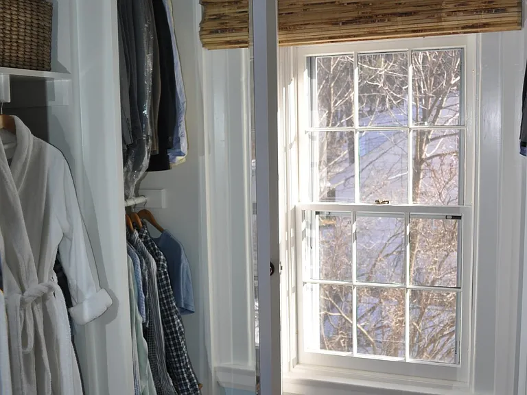 closet space with large mirror