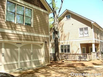 Two car garage with large room on top
