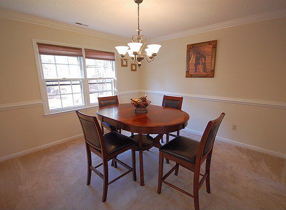 Heavy crown & chair rail moldings & upgraded chandelier!