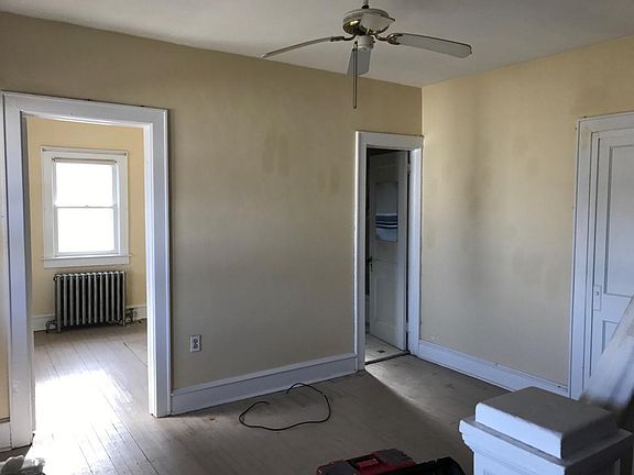 Living room with adjacent office and bathroom