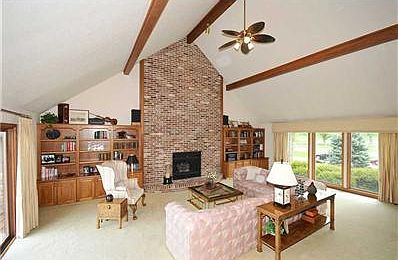 Great Room. This is a true great room!  It features two picture windows, a floor-to-ceiling fireplace and cathedral ceilings.